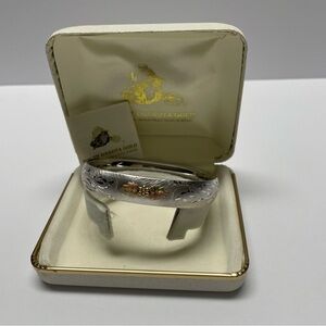 Elegant Silver and Gold Bracelet